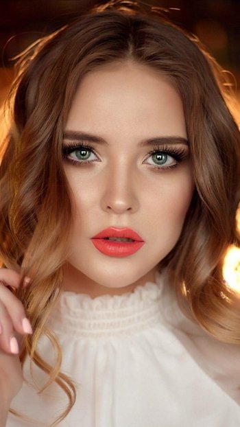 lipstick green eyes brunette face woman model Phone Wallpaper