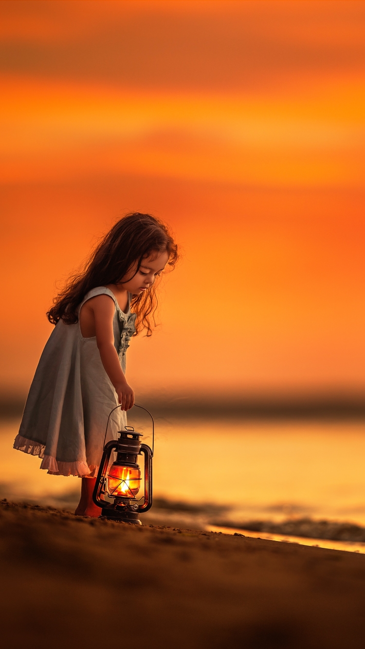 Little Girl on the Beach at Sunset