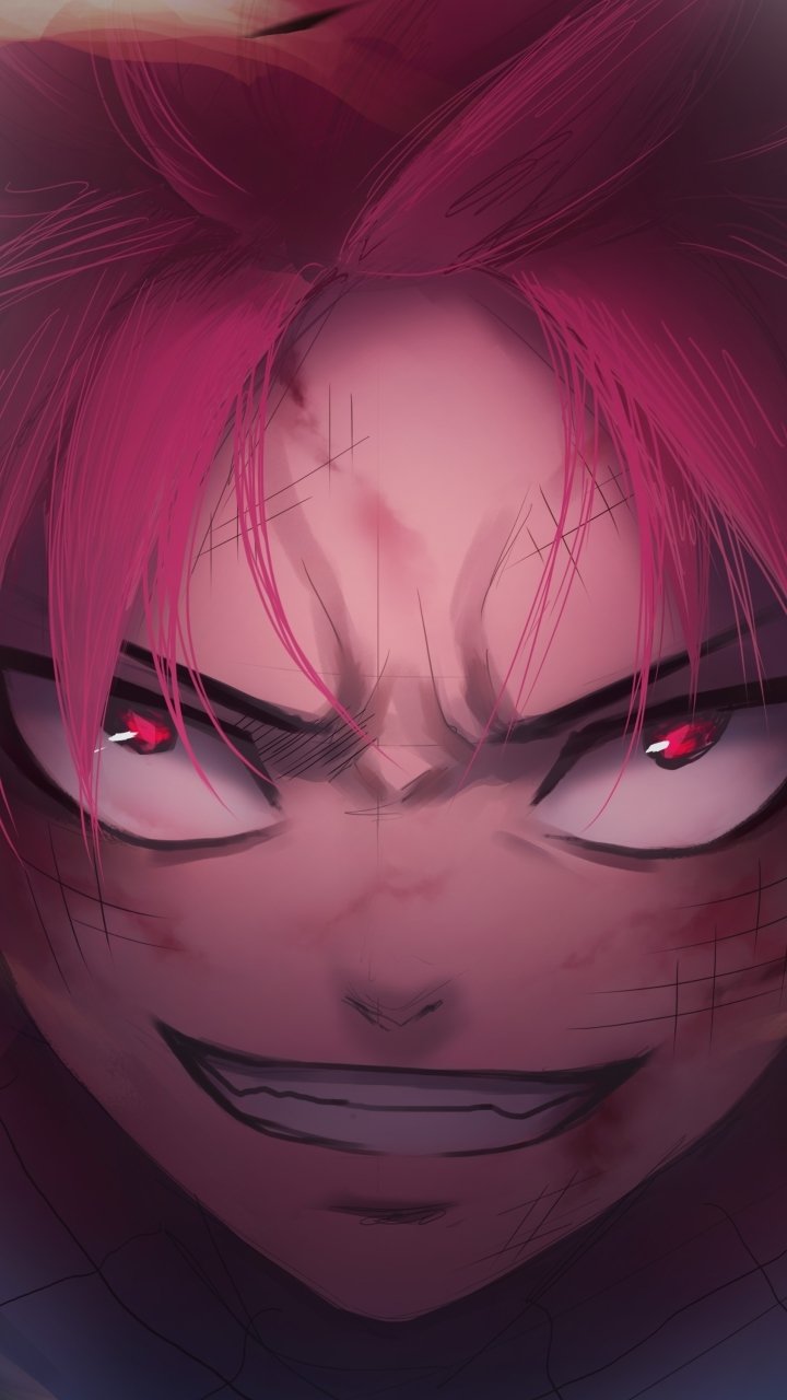 Close-up phone wallpaper of Natsu Dragneel from the anime Fairy Tail, showcasing his intense red eyes and fierce expression with vibrant pink hair.
