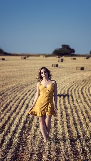 depth of field yellow dress summer field woman model Phone Wallpaper