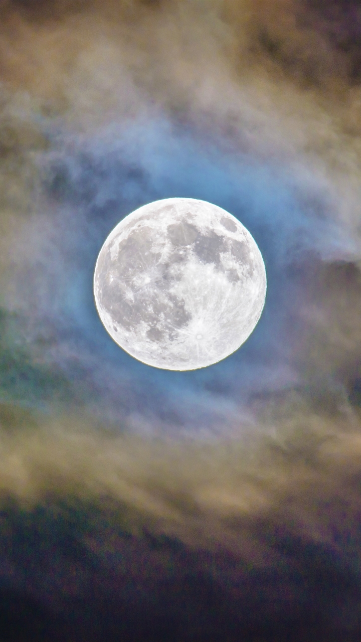 Full Moon in Cloudy Night Sky