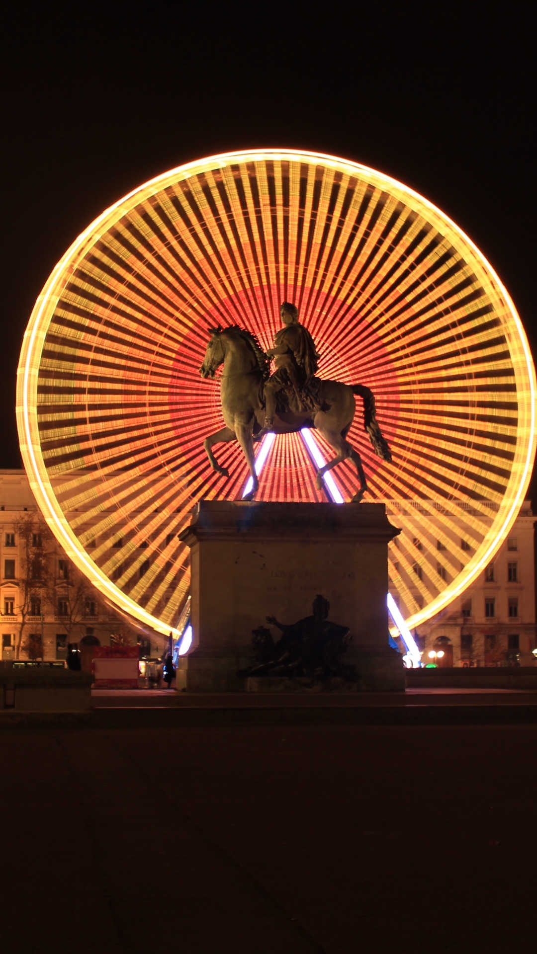 Ferris wheel andStatue of King Louis XIV in La Place Bellecour Lyon, France by Thomas43