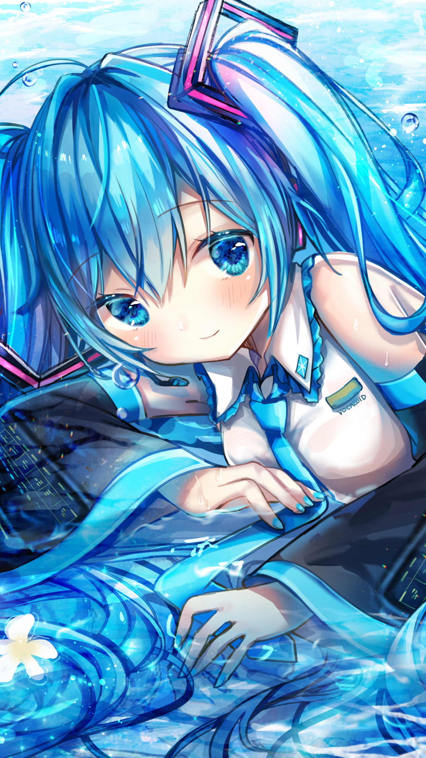 Phone wallpaper of anime Vocaloid Hatsune Miku with blue twintails, bright blue eyes and signature outfit, smiling as her hair flows through shimmering water.