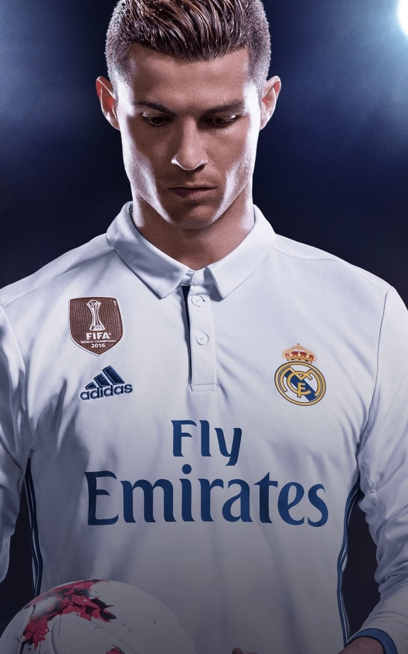 Phone wallpaper featuring Cristiano Ronaldo from FIFA 18, showcasing him in a Real Madrid jersey with a focused expression, designed for iPhones and Android devices.