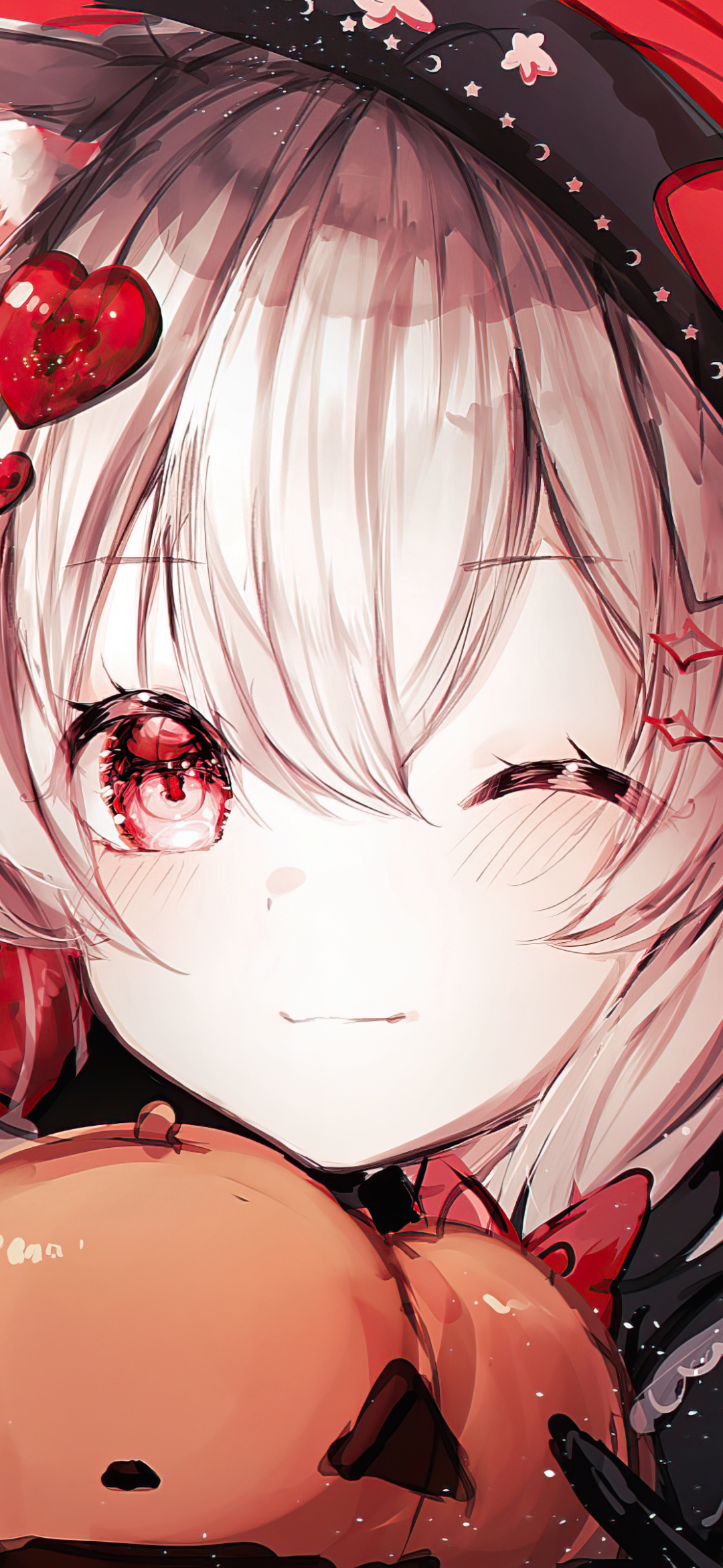 Close-up anime witch girl winking, pale hair, red eyes and heart hairpin, hugging a jack-o'-lantern — vibrant red and black phone wallpaper.