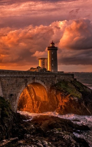  Lighthouse at Sunset by Denis009