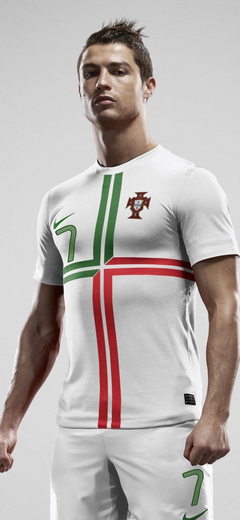 Phone wallpaper image of Cristiano Ronaldo in a Portugal soccer jersey, designed for iPhone and Android screens.