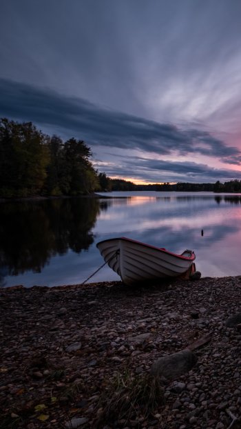  Boat on Coast - Sunset by Mikael Järnåsen