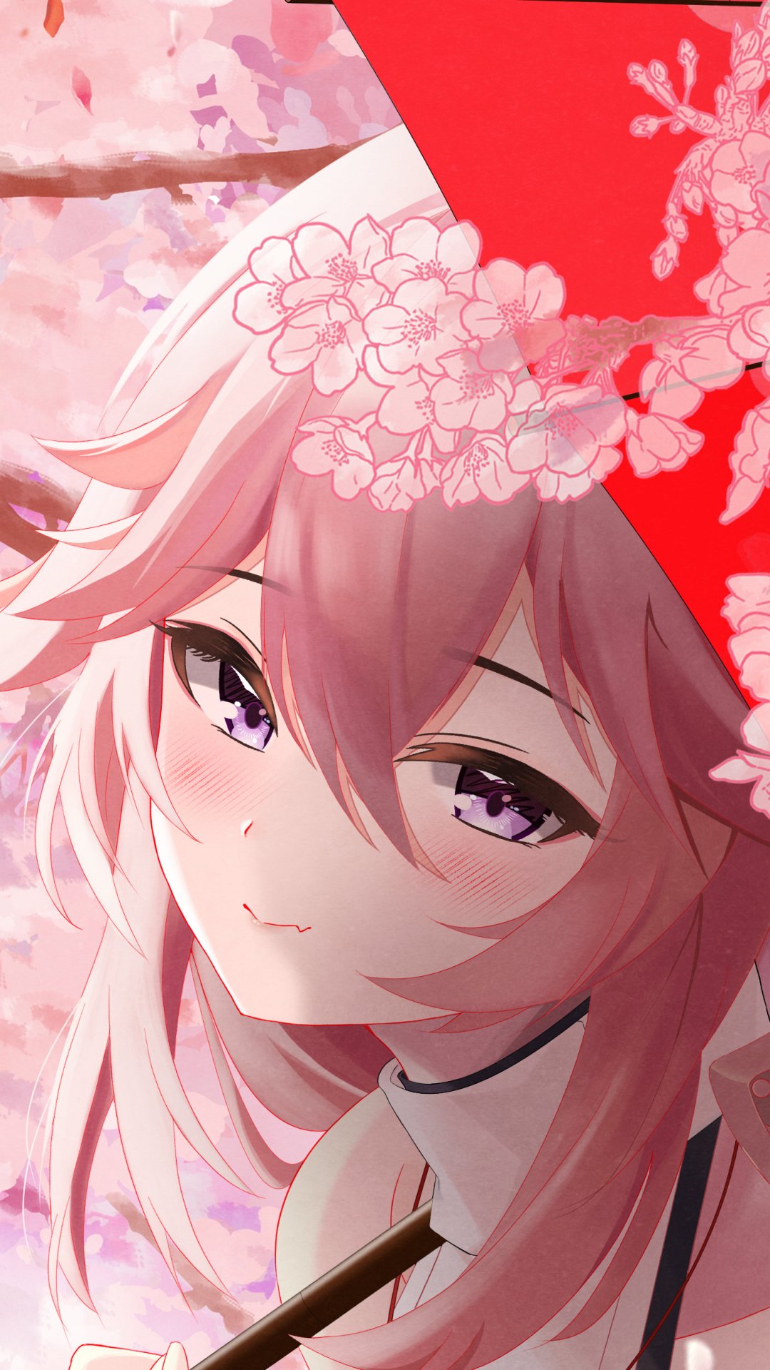 Phone wallpaper of Yae Miko, the Guuji from the video game Genshin Impact: close-up portrait amid cherry blossoms, soft smile, flowing pink hair and a red umbrella.