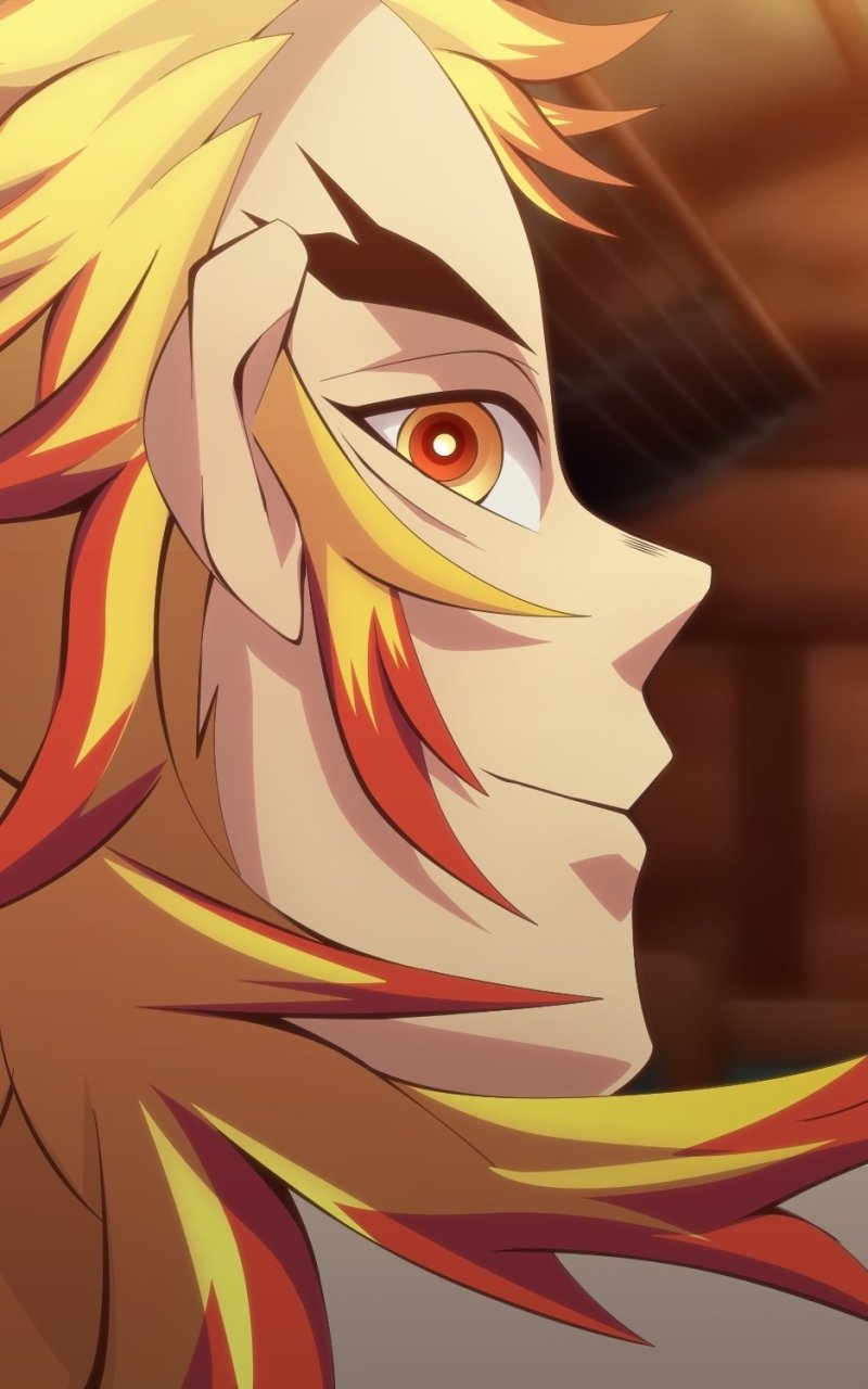 Phone wallpaper showing Kyojuro Rengoku from Demon Slayer: Kimetsu no Yaiba — close-up profile with flame-colored hair, striking golden eyes, and a warm, blurred background.