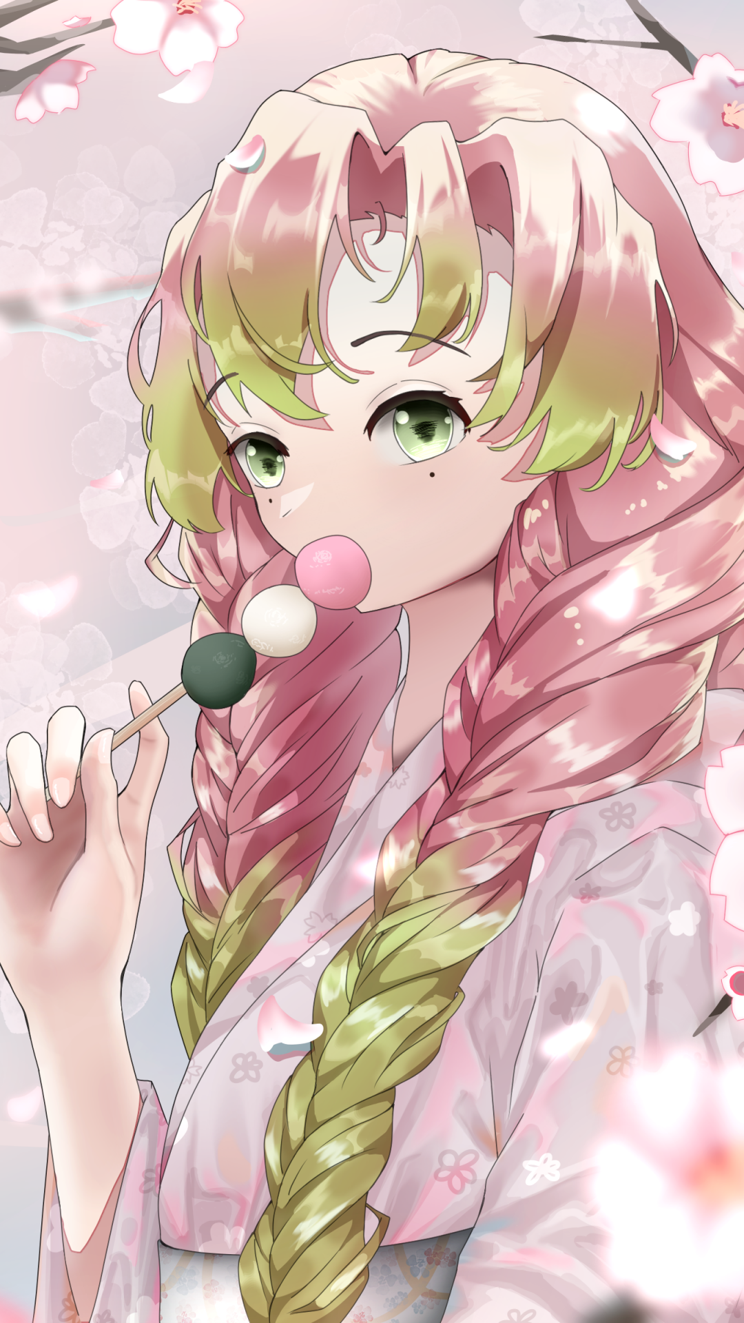 Phone wallpaper of Mitsuri Kanroji (Demon Slayer: Kimetsu no Yaiba): close-up anime portrait with braided pink-green hair, pastel kimono, holding three-color dango amid falling cherry blossoms.