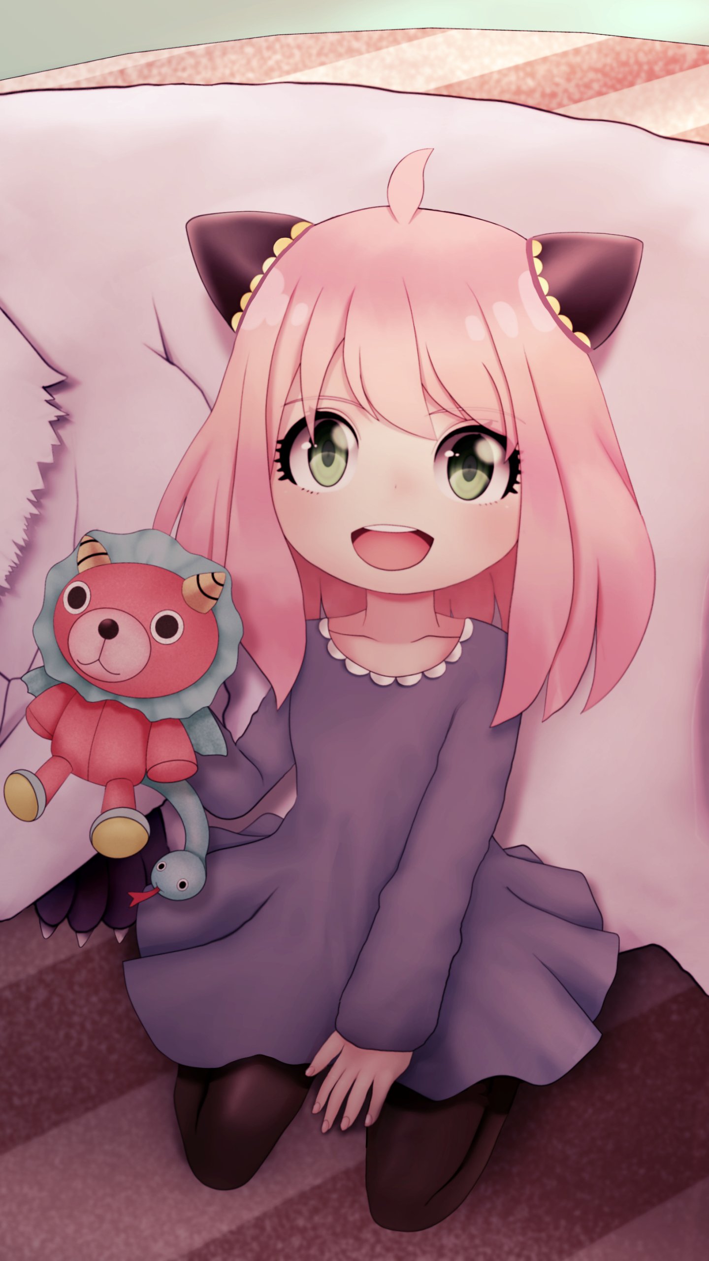 Anime-style wallpaper featuring Anya Forger from Spy x Family with pink hair and cat ears, holding a teddy bear, designed for iPhone and Android screens.