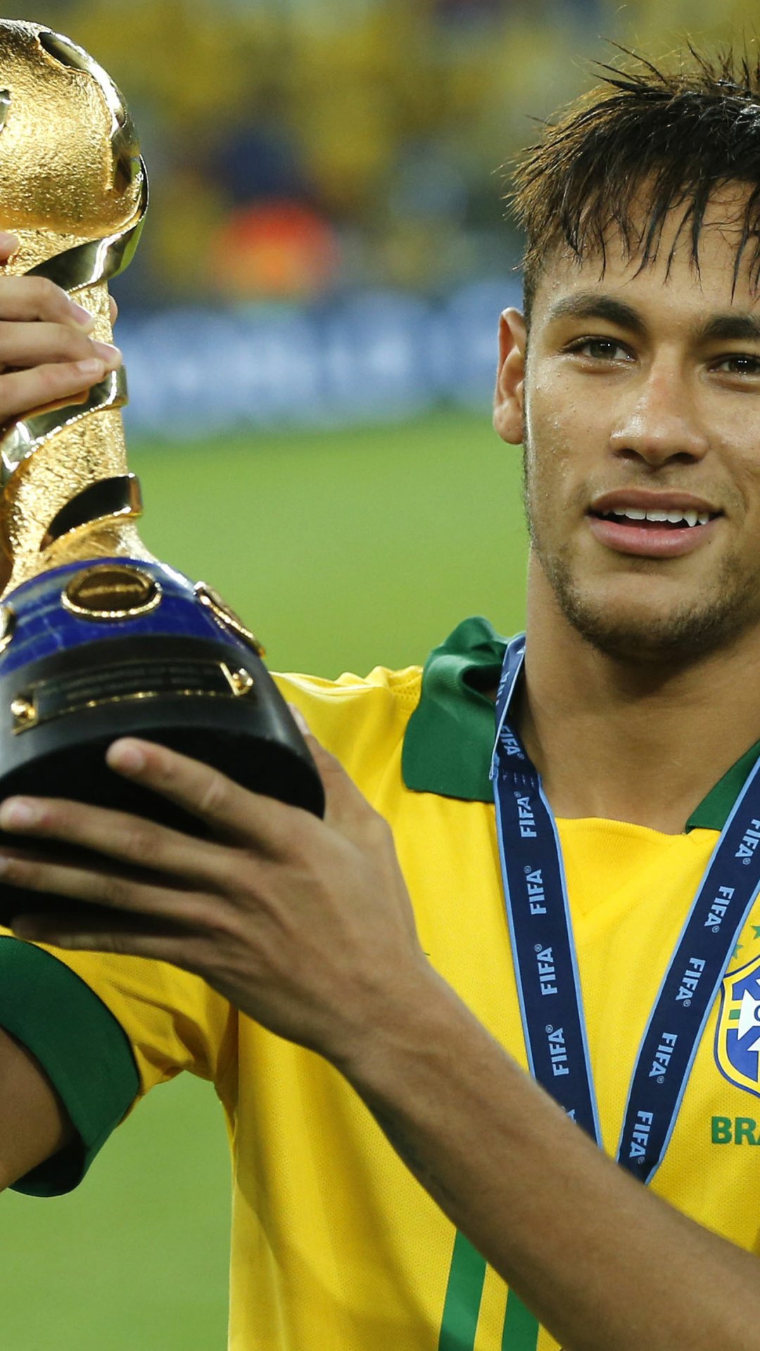 Phone wallpaper featuring Neymar holding a gold soccer trophy, designed for both iPhone and Android screens, capturing a triumphant sports moment.
