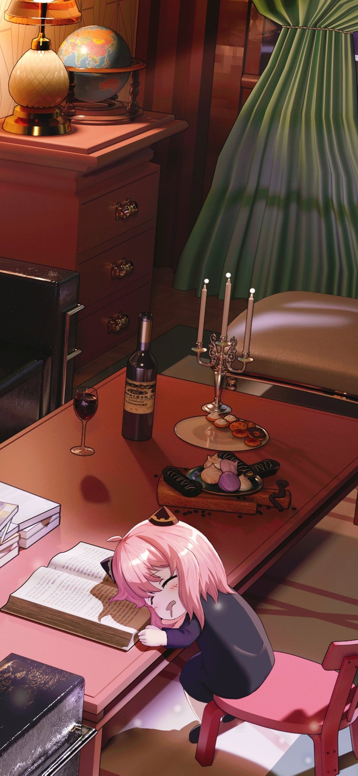 Phone wallpaper of Anya Forger (Anime, Spy x Family) dozing head-down on an open book at a cozy study desk with lamp, globe, wine, candelabra and pastries.