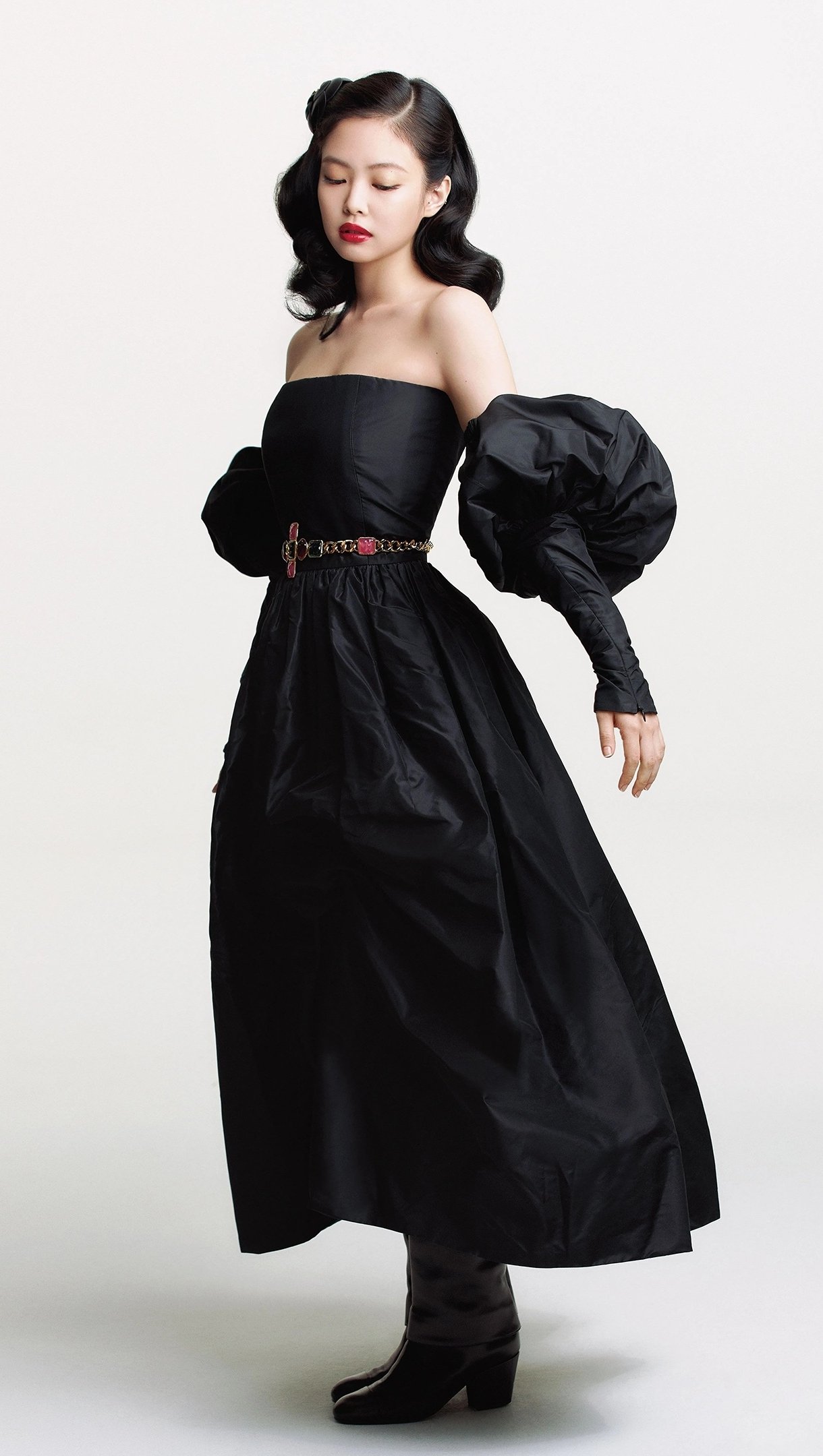 Phone wallpaper featuring a BlackPink member in a stylish black dress, blending music and fashion, compatible with iPhones and Android devices.