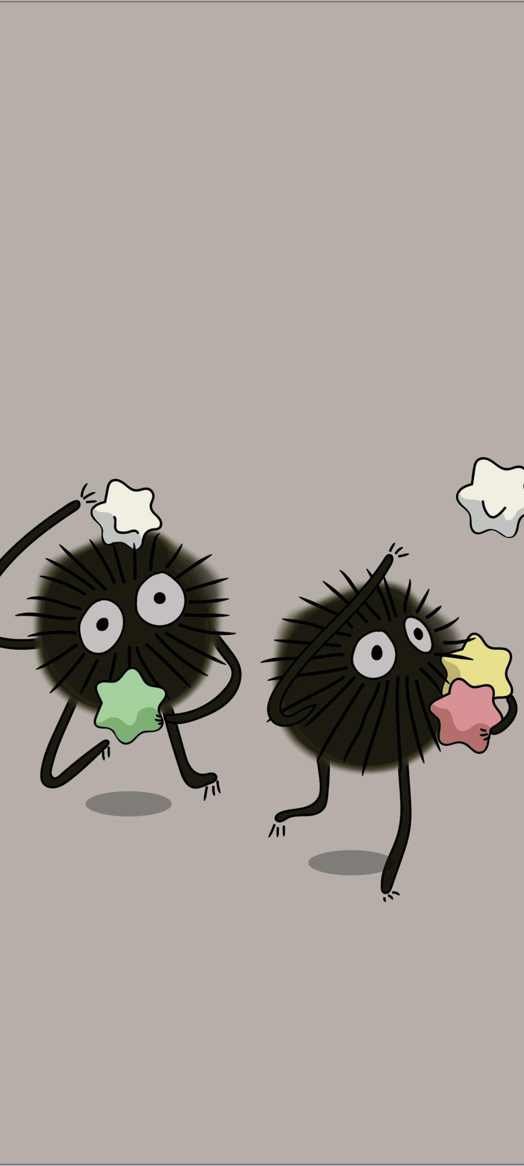 Anime phone wallpaper inspired by Spirited Away: two playful soot sprites (susuwatari) on a gray background holding colorful star-shaped candies.