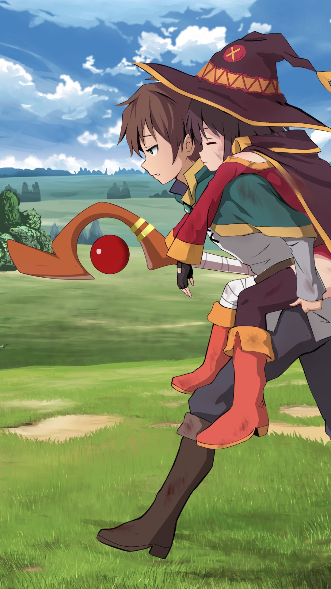 Phone wallpaper (iPhone/Android): KonoSuba anime scene of Kazuma carrying Megumin piggyback across a sunny grassy field, Megumin’s crimson hat and staff visible.