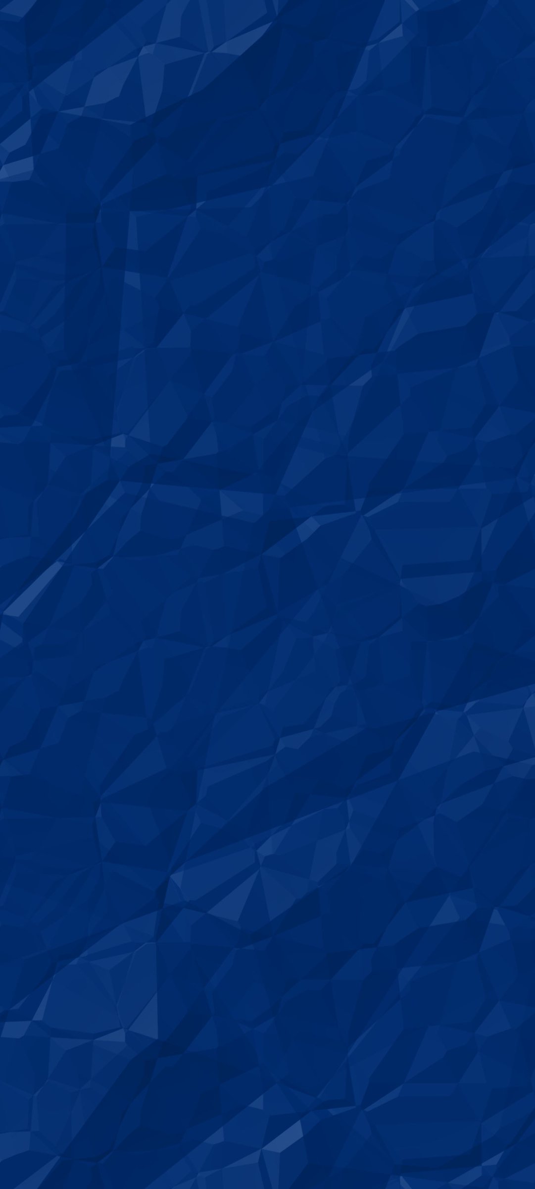 Abstract blue phone wallpaper with crumpled, faceted geometric texture in deep navy tones.