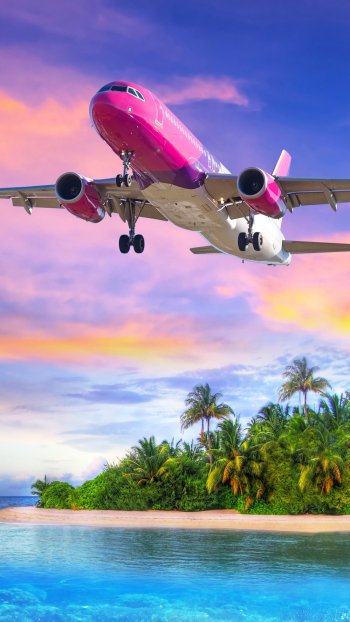 Plane Leaving Tropical Island at Sunset