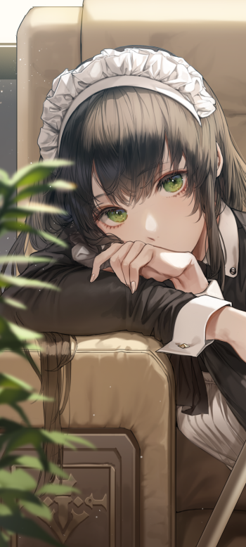 Vertical phone wallpaper of an anime girl in a maid outfit reclining on a couch, soft lighting and green eyes — for iPhone and Android phones.