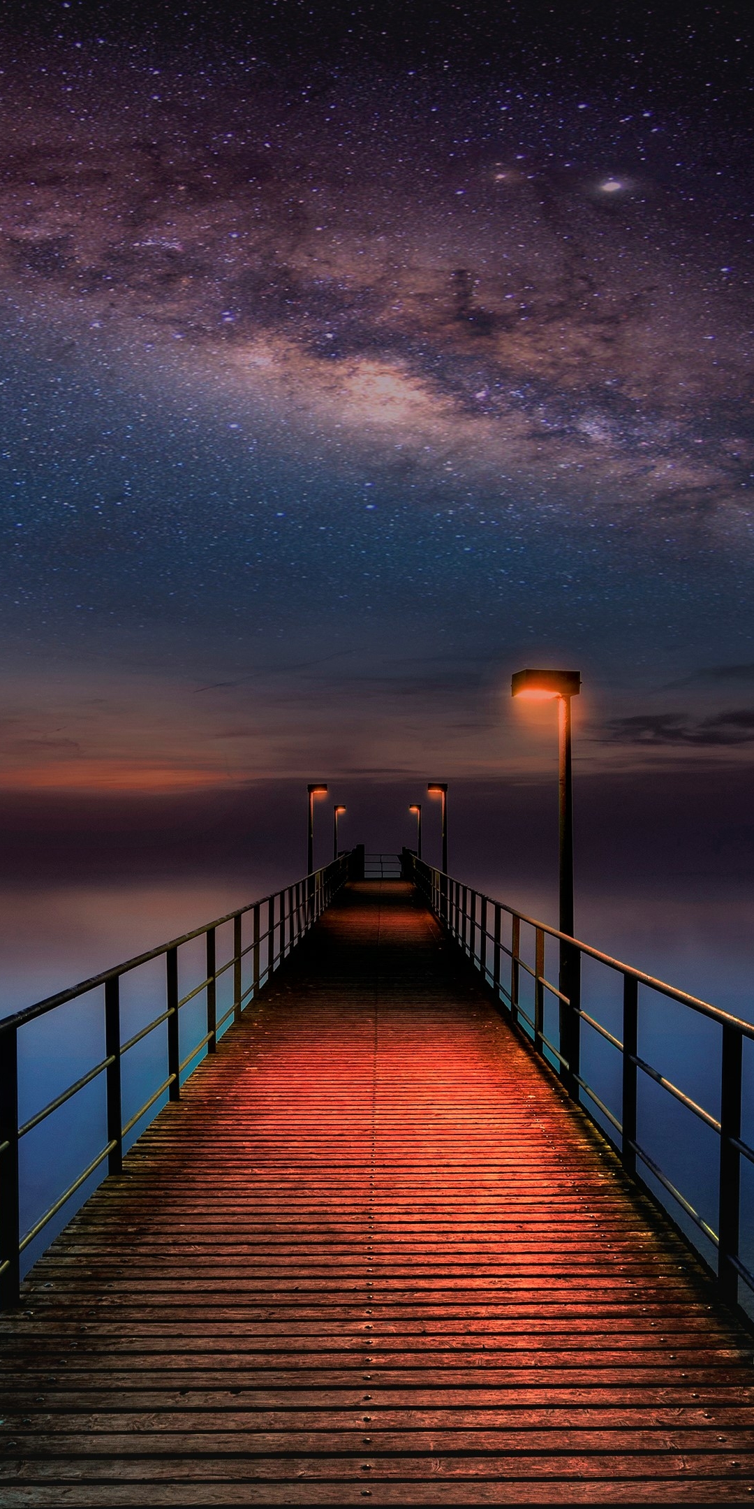 Ocean Pier under Milky Way Sky