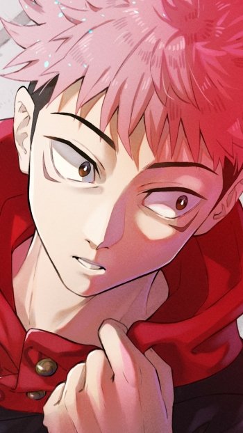Phone wallpaper of Yuji Itadori from Jujutsu Kaisen: close-up anime portrait with pink hair, intense eyes and red hoodie, soft shadows and dramatic red lighting.